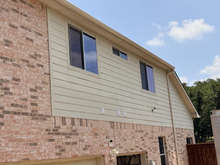 Completed siding repair and exterior painting project in Denton, TX by Renewltx